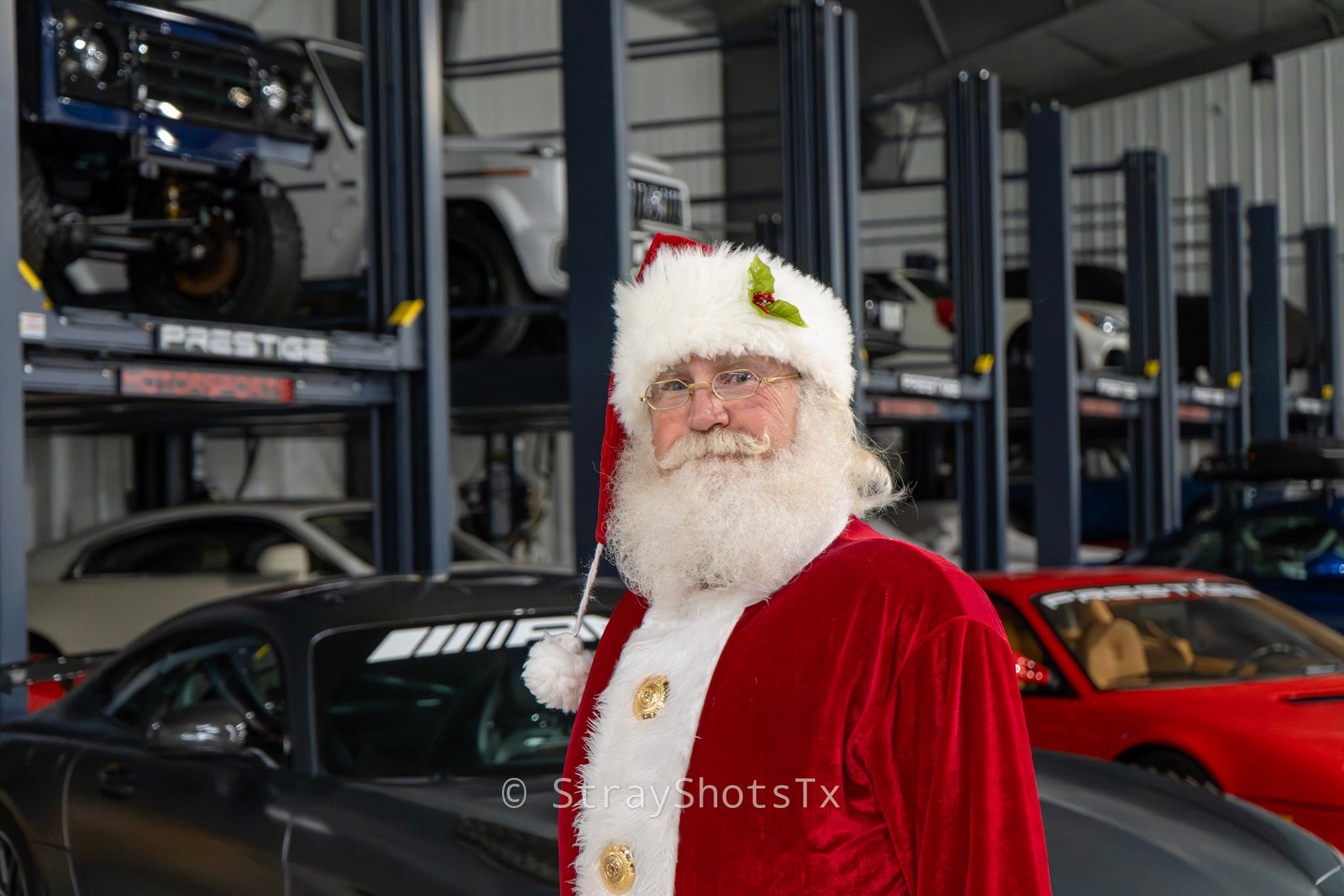 Santa appearing at a San Antonio automotive event